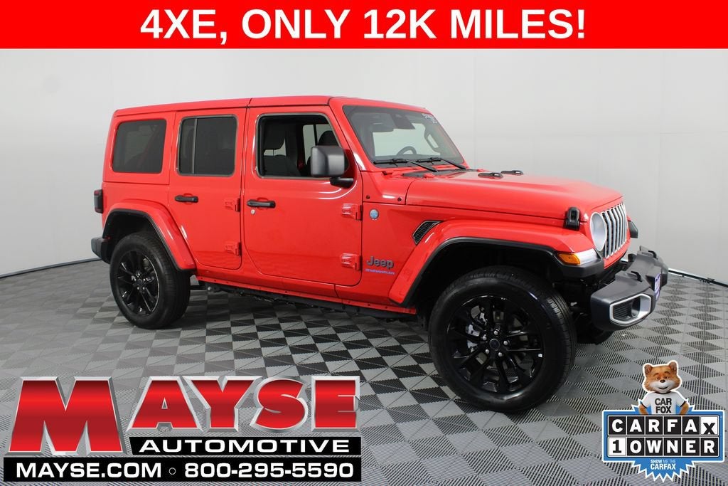 2025 Jeep Wrangler 4xe Sahara in Red/Sahar/4Xe — front three-quarter view