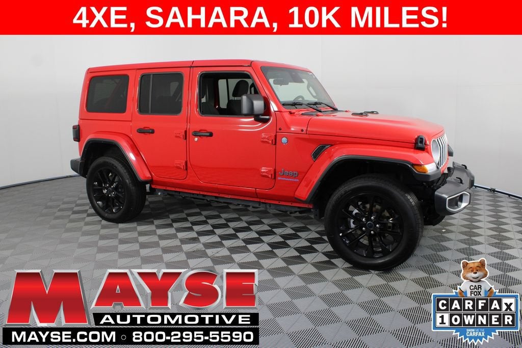 2025 Jeep Wrangler 4xe Sahara in Red/Sahara/4Xe — front three-quarter view