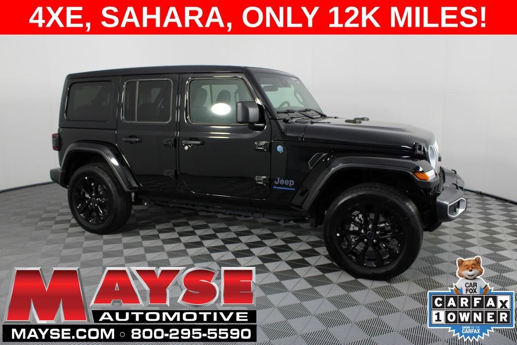2025 Jeep Wrangler 4xe Sahara in Black/Saha/4Wd — front three-quarter view
