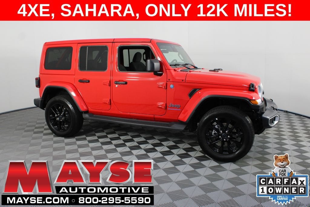 2025 Jeep Wrangler 4xe Sahara in Red/Sahara/4Xe — front three-quarter view
