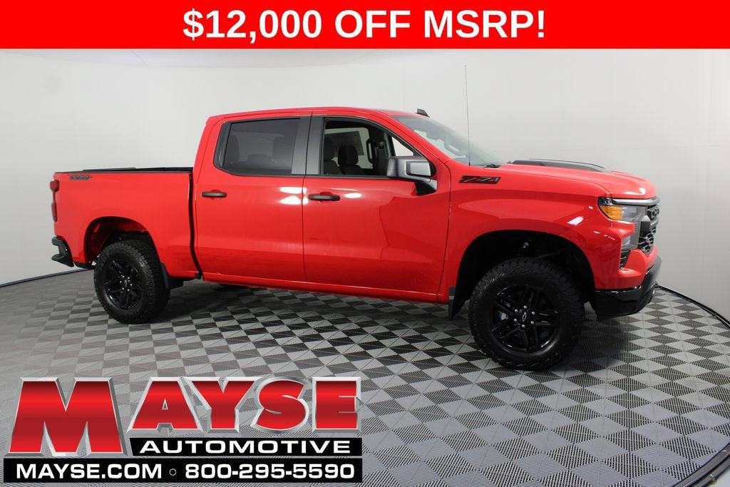 2026 Chevrolet Silverado 1500 Custom Trail Boss in Red Hot — front three-quarter view