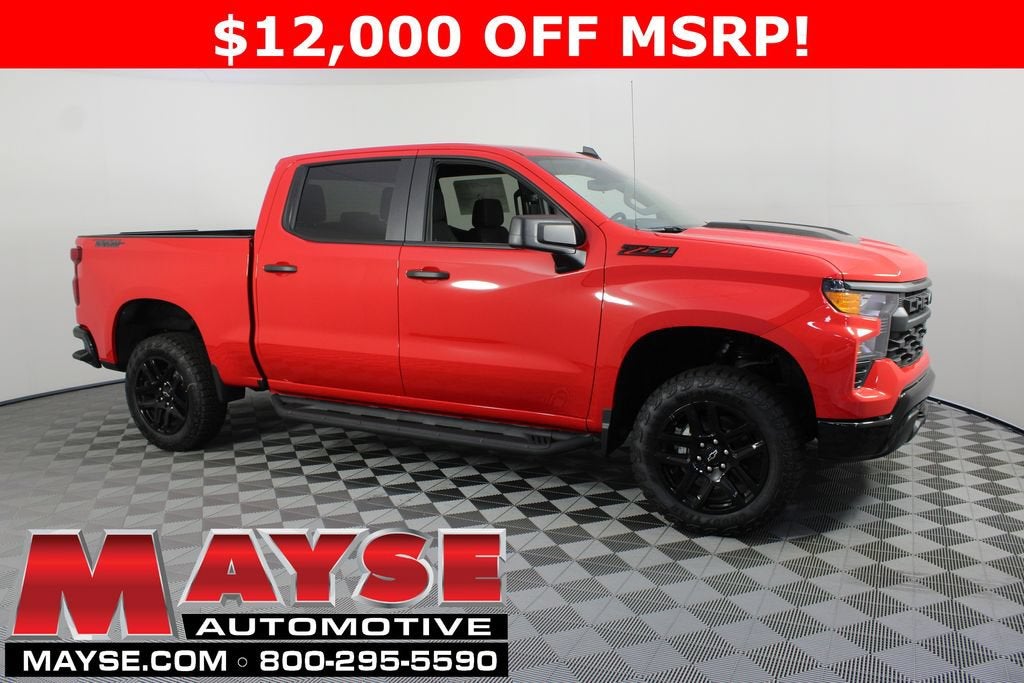 2026 Chevrolet Silverado 1500 Custom Trail Boss in Red Hot — front three-quarter view